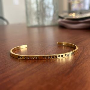 Woman’s faith bracelet. By grace through faith